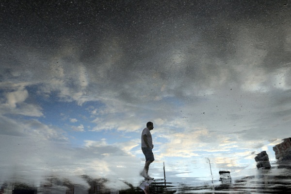 Zoe Strauss, Walking Wawa Parking Lot, Philadelphia, 2008.