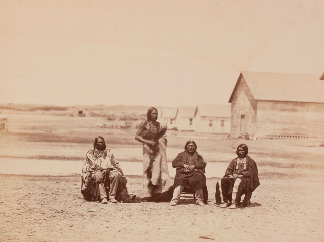 Alexander Gardner, Lone Horn, Pipe, Grass and Young Elk, 1868.