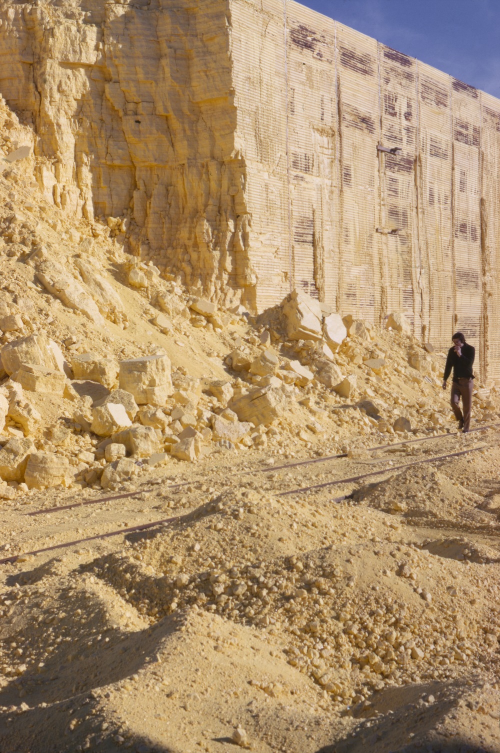 Unknown photographer, Robert Smithson in a Sulfur Pit, Rosenberg, Texas (near Houston), 1969.