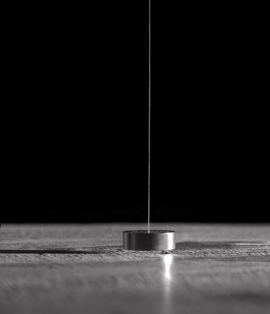 Robert Barry, teel Disc Suspended 1/8 in. Above Floor, 1967. Collection of the Hirshhorn Museum and Sculpture Garden, Washington.