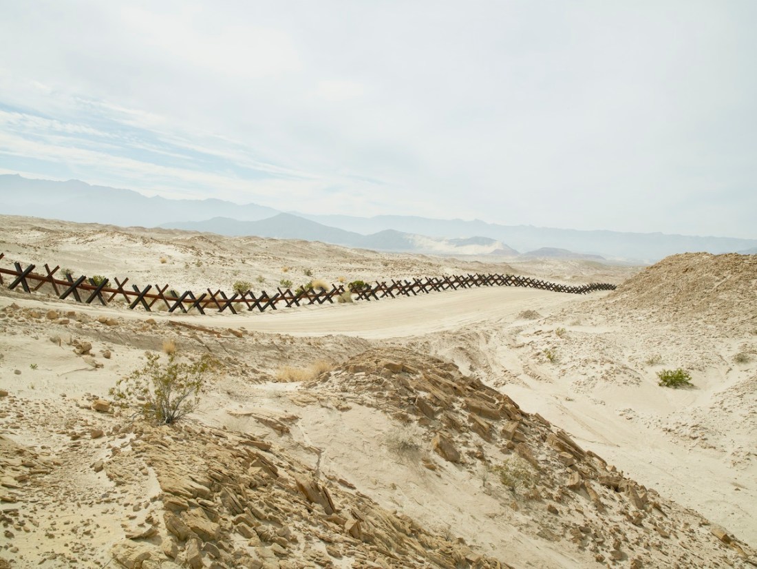 Richard Misrach, Wall (Normandy-style vehicle barrier) near Ocotillo, California, 2015.