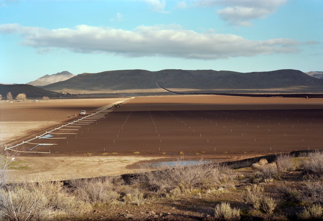Victoria Sambunaris, Untitled (Farm with workers), Jacumba, CA, 2010.