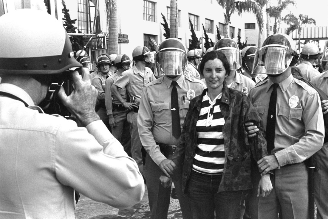 Frame from Fred Lonidier, 29 Arrests: Headquarters of the 11th Naval District, May 4, 1972, San DIego, 1972. 