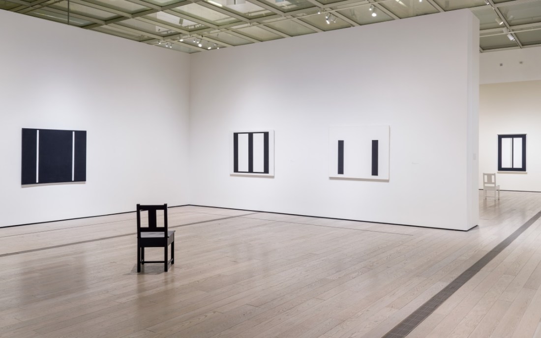 John McLaughlin retrospective as installed at LACMA with chairs designed by Roy McMaMakin.
